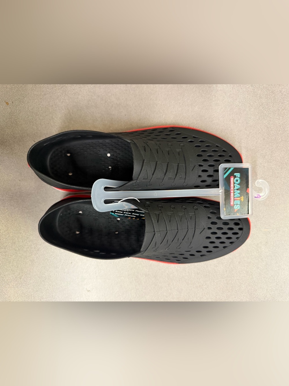 Skechers Black Slip-On Foamies with Red Accent